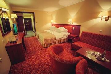 Фото номера Двухместный номер с 2 отдельными кроватями Отель Hotel Gołębiewski Mikołajki г. Миколайки 5